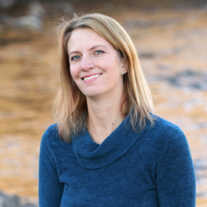 Smiling Woman in a blue sweater